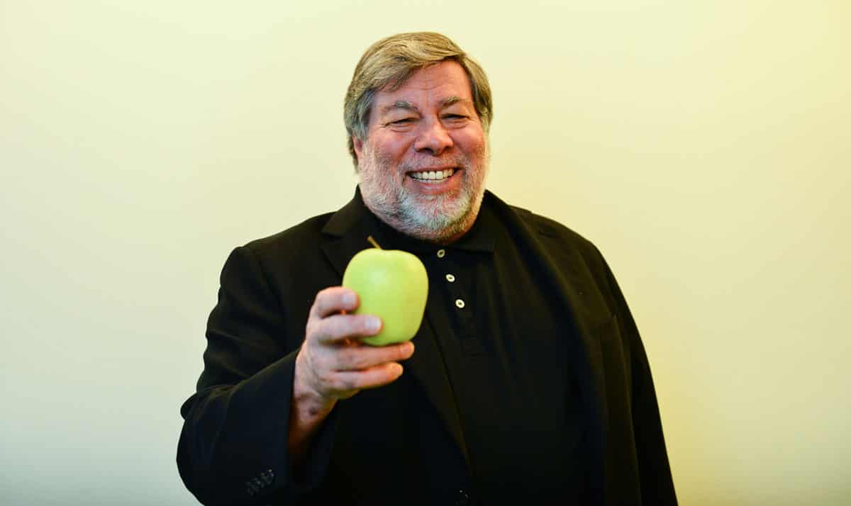 Steve Wozniak holding an apple