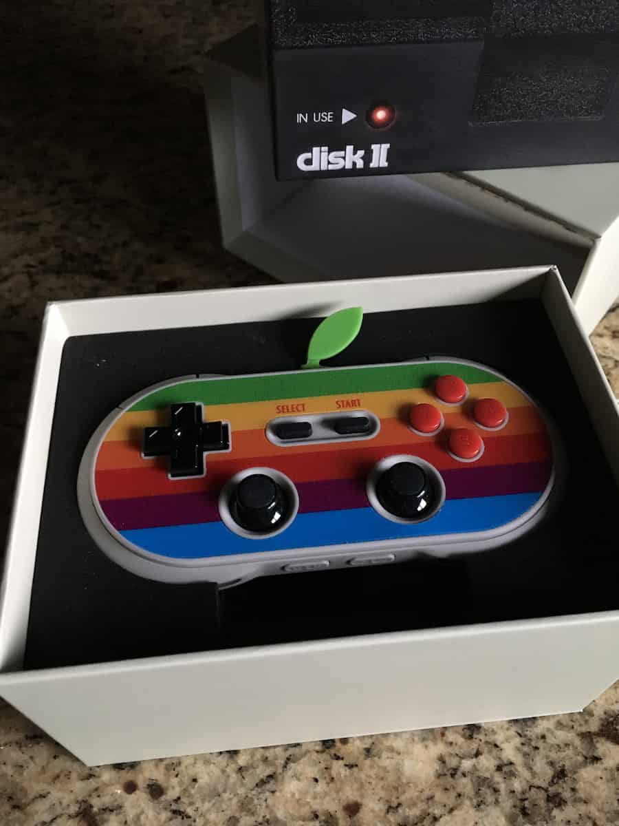 Image of the limited edition 8Bitdo controller with old Apple logo stripes