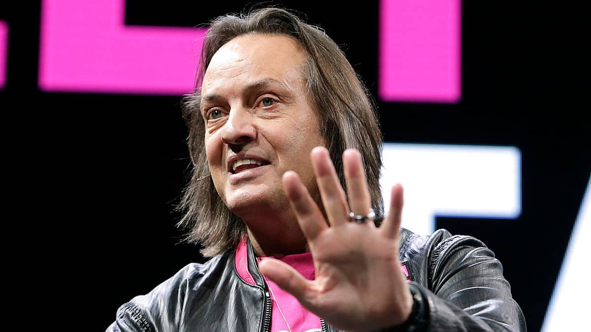 Image of T-Mobile CEO John Legere, offering a new iPhone BOGO deal.