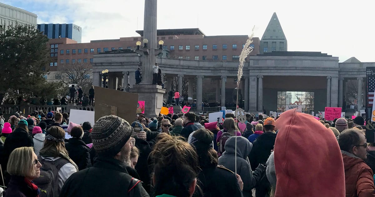 Protesters in Denver speaking out against Donald Trump's anti-woman and anti-immigration policies