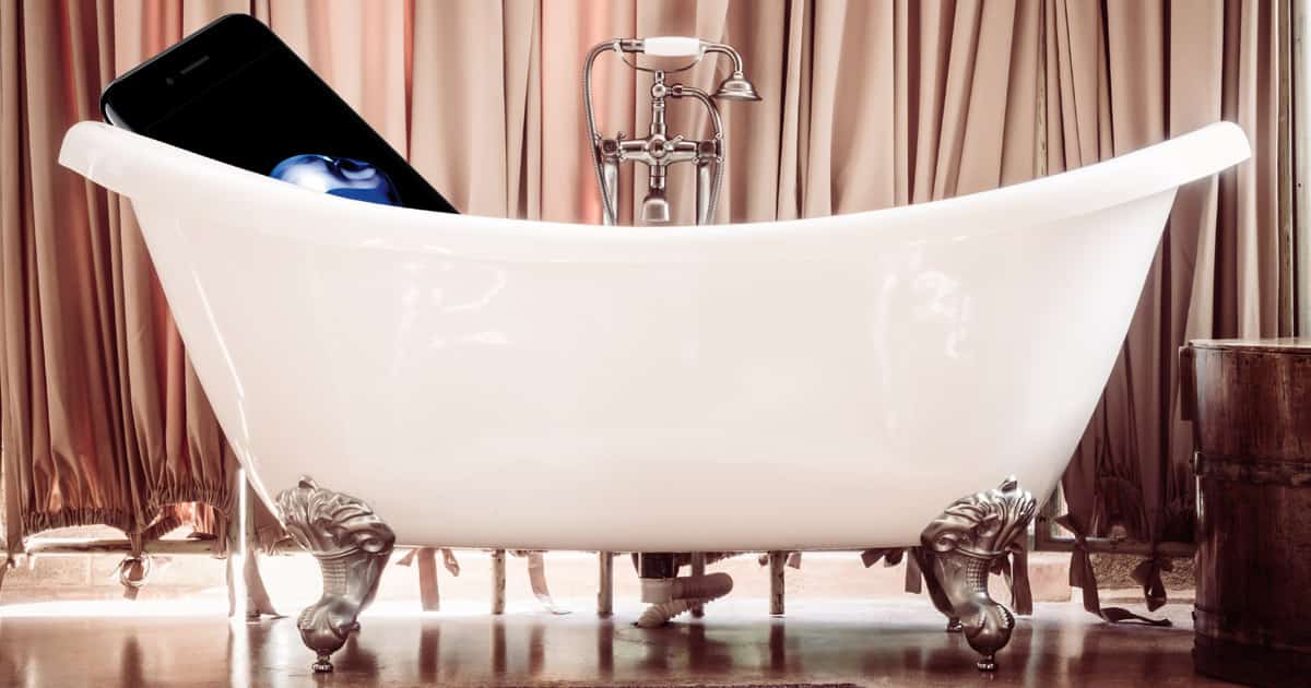 An iPhone in a bath tub