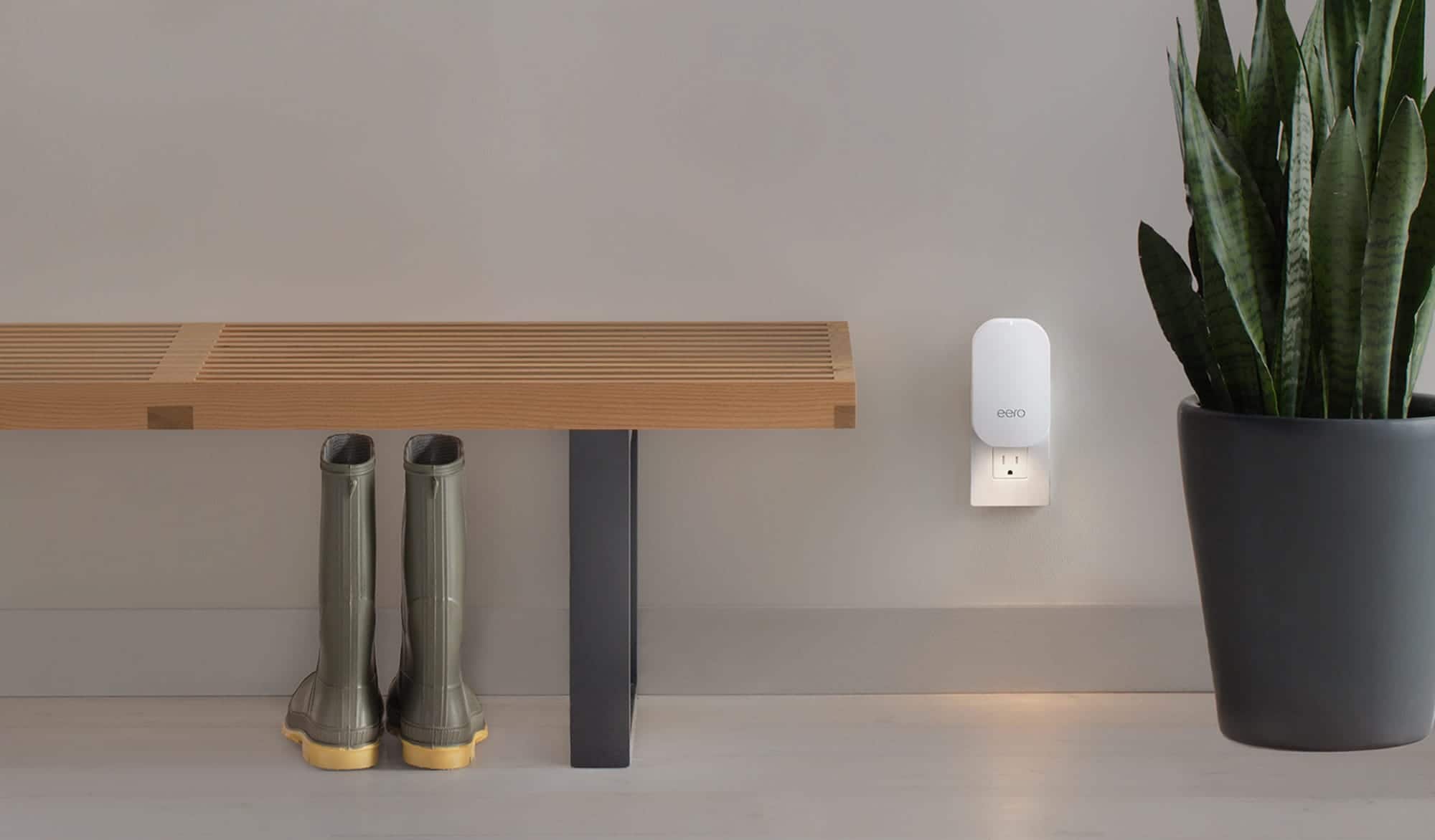 eero Beacon plugged into an outlet with nightlight on