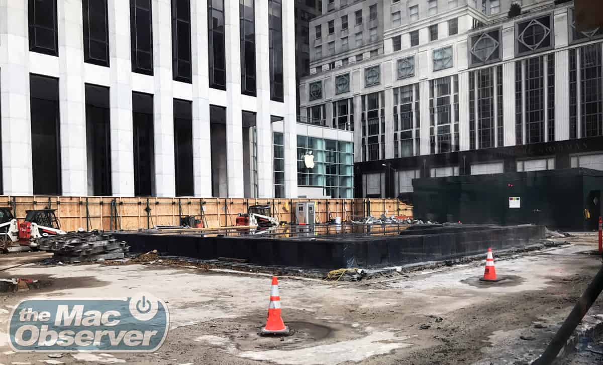 Shot from the north; the black tarp covers where the glass cube used to stand, and behind that you see the temporary apple store front where the old FAO Schwarz toy store used to reside.