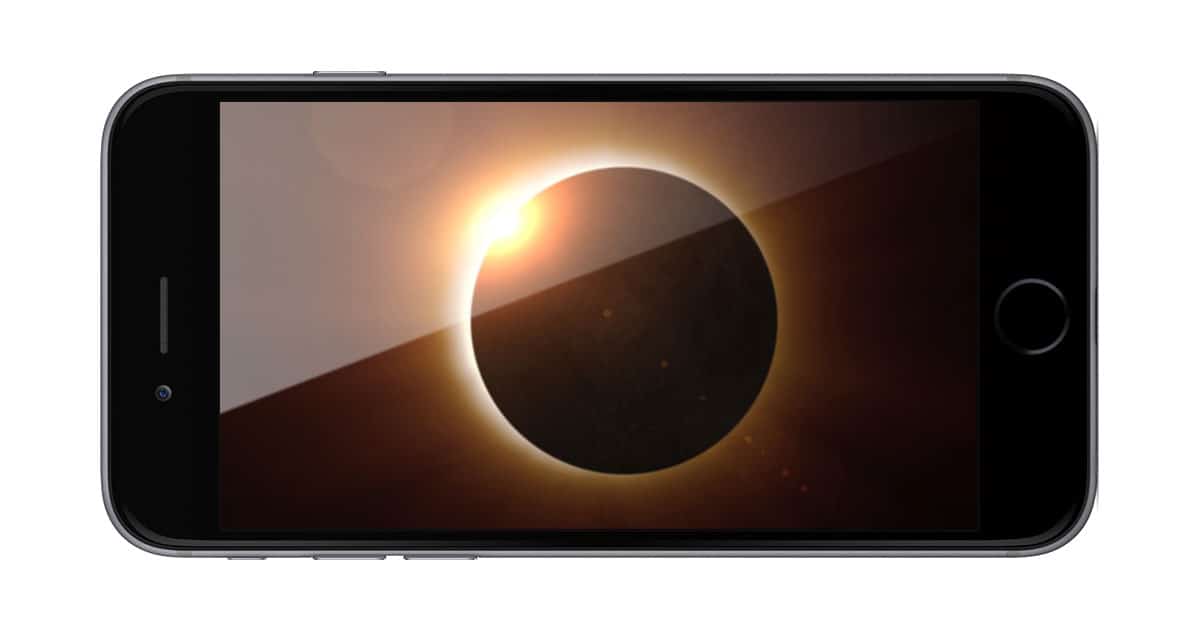 iPhone with solar eclipse