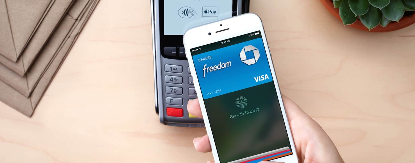 image of person using apple pay