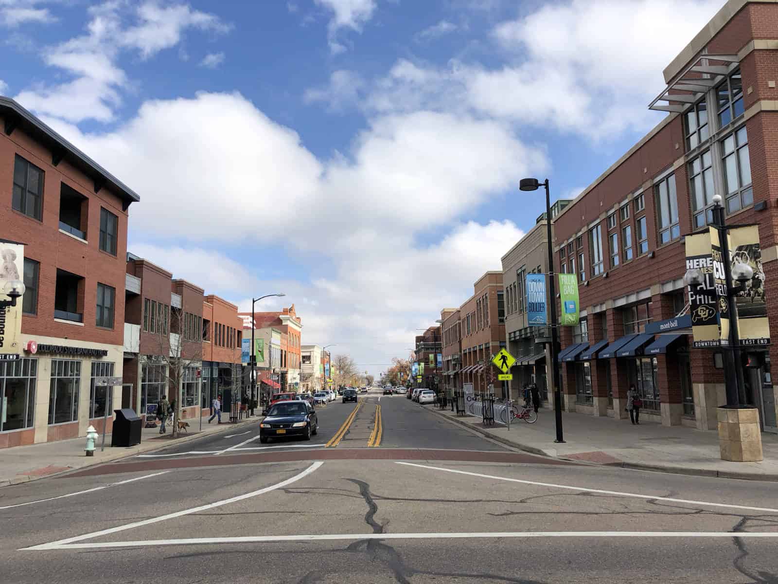 iPhone X city street with bright sky and clouds photo