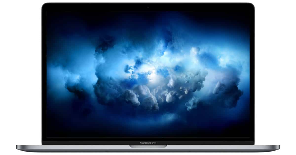 MacBook Pro with blue cloud desktop wallpaper