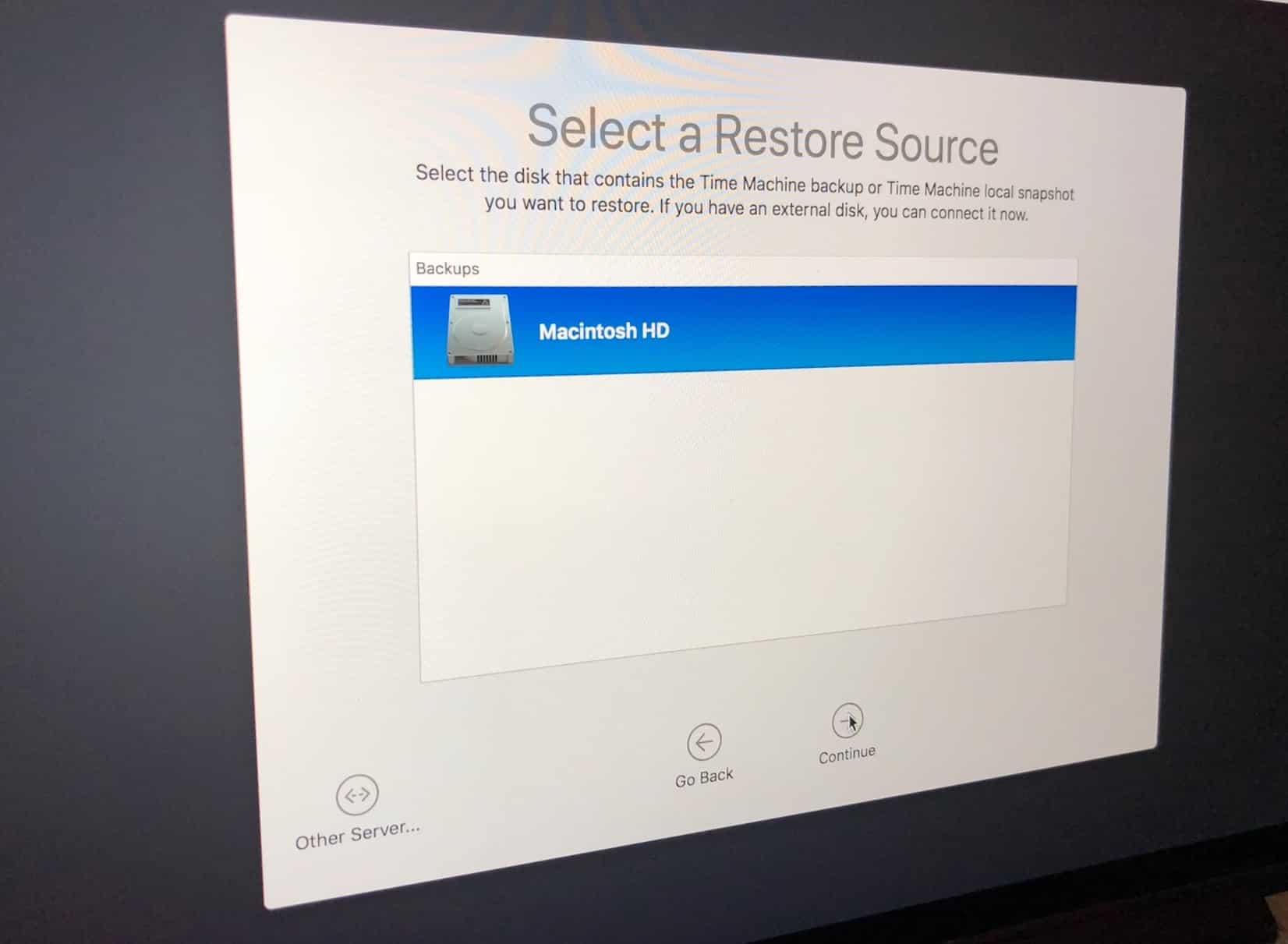 Select a Restore Source in macOS Recovery Mode