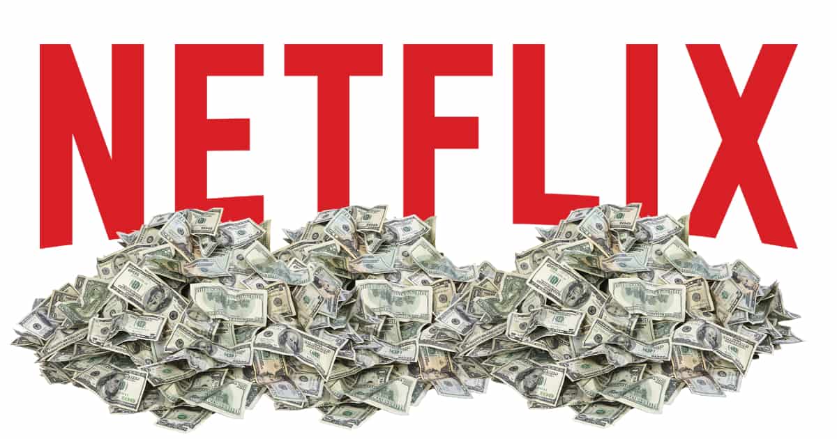 Netflix logo in a big pile of cash