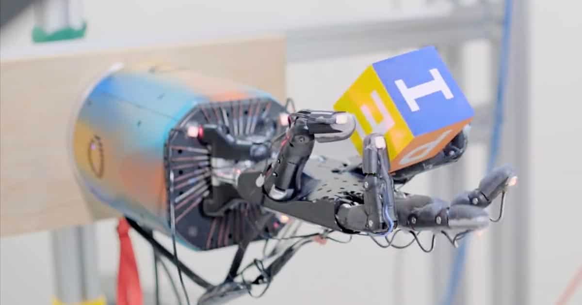 Watch This Robot Hand Learn How to Manipulate a Block