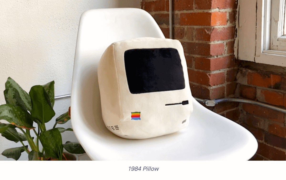 Image of the 1984 pillow as part of the Apple decorations collection.