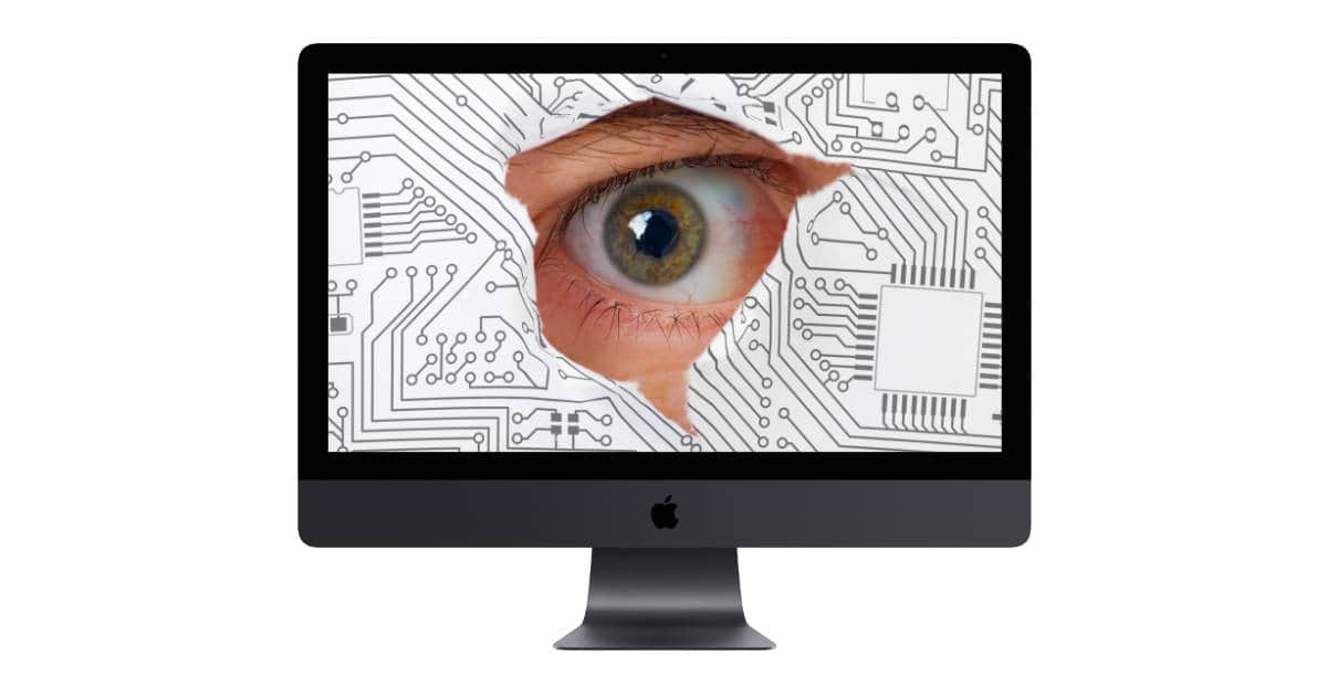 iMac with spy watching through screen
