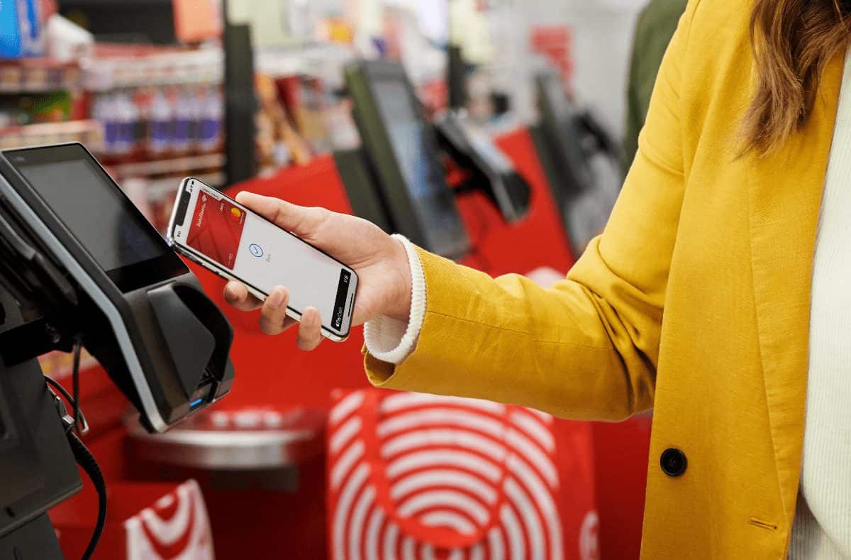 woman using apple pay at target