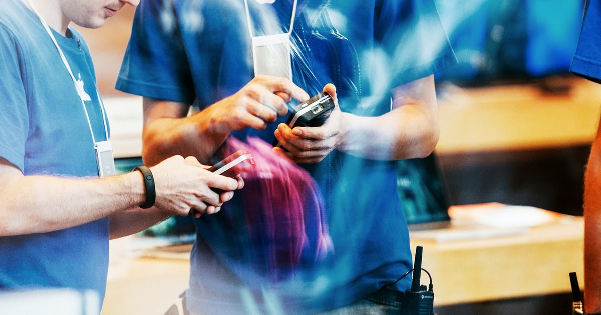 Staff working in an Apple Store