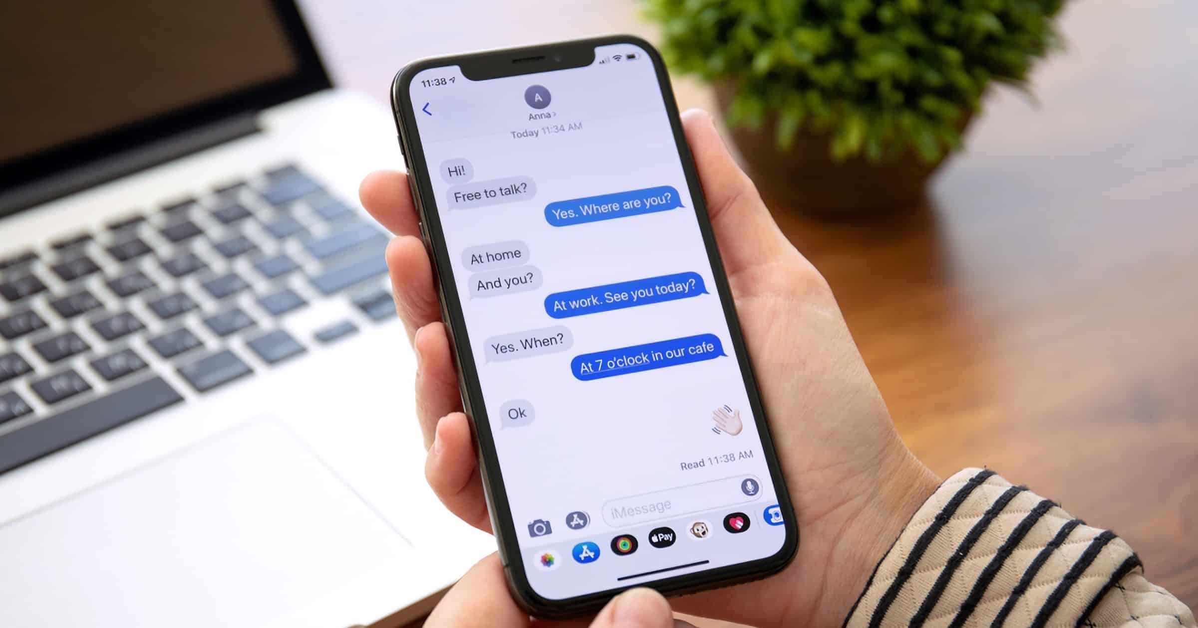 Woman using iMessage on iPhone X