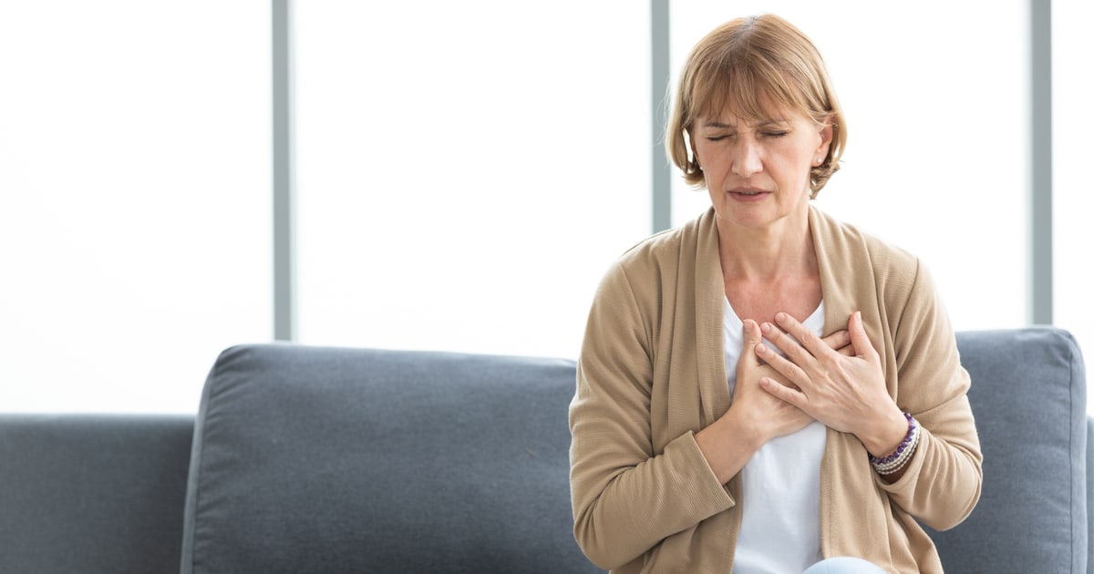 woman suffering heart pains