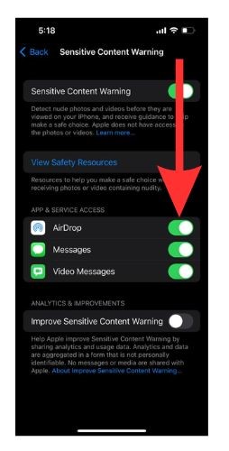 Toggle on the buttons for the apps you want to turn Sensitive Content Warning on for