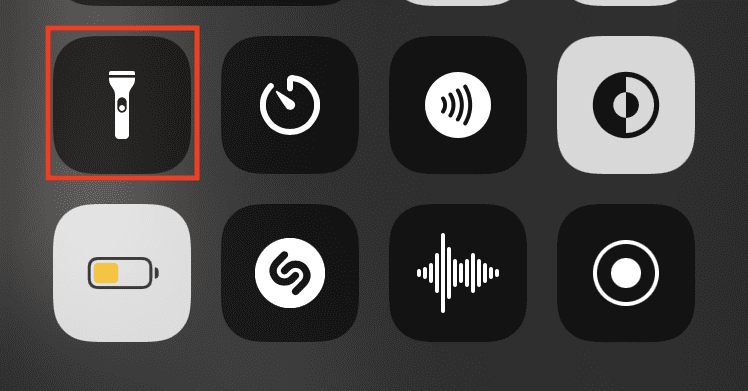 Toggle the flashlight icon on in control center