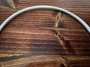 MacBook charging cable white