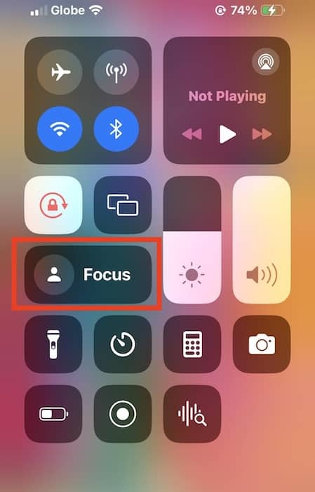 Swipe Down on Control Center for the Focus Button