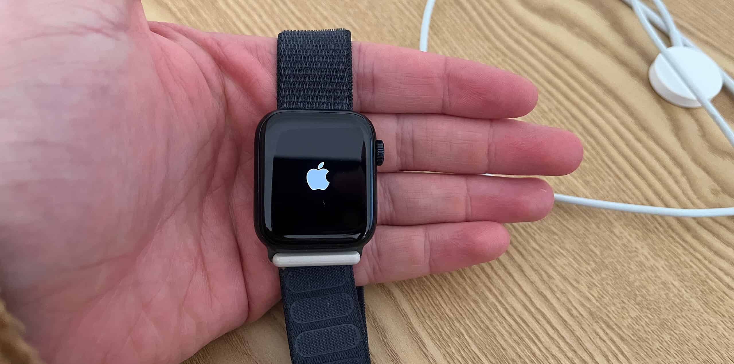 The Apple logo appearing on an Apple Watch