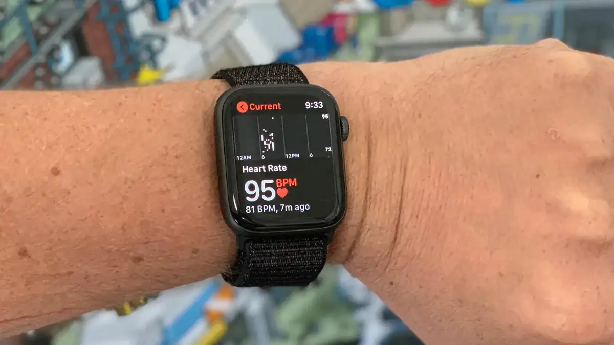 cuff on upper arm at heart level apple watch