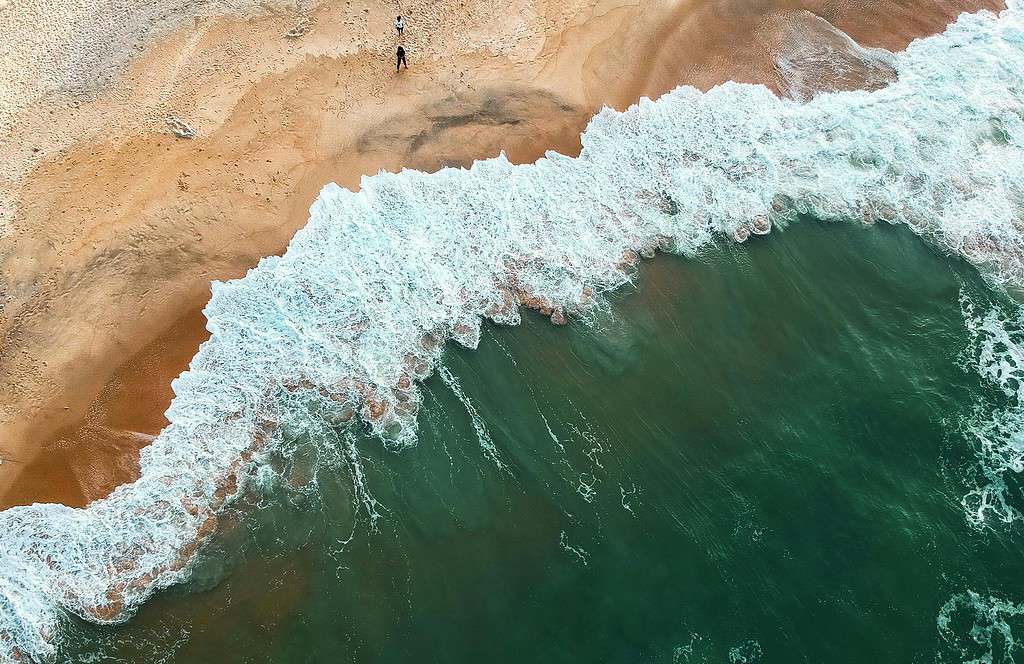 macOS Tahoe Wallpapers-Seawaves on Sands