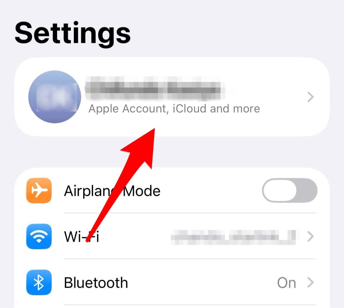 Tap your name in iPhone settings.