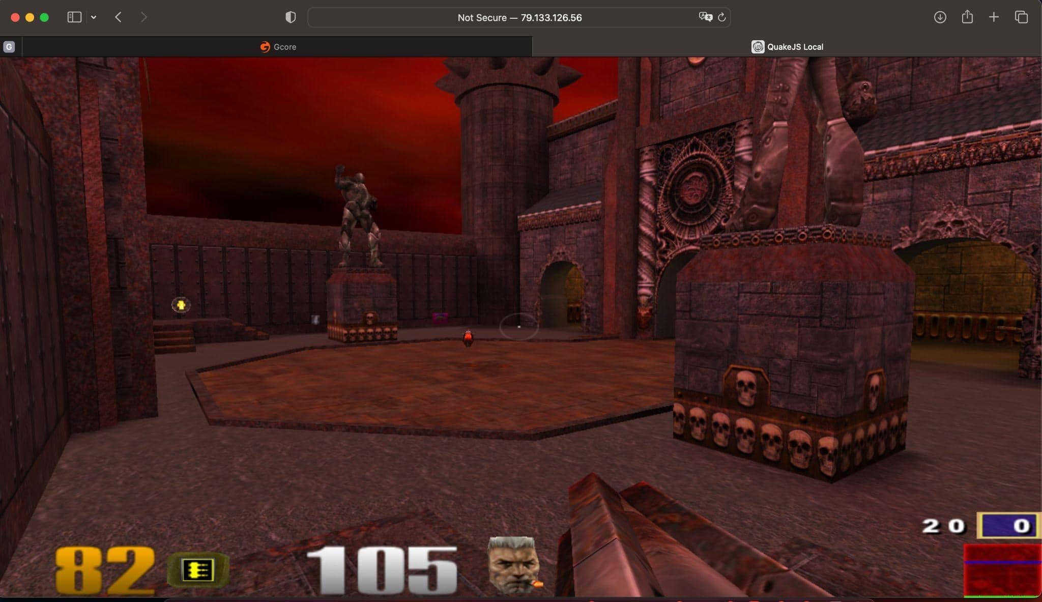 First-person view of Quake III Arena gameplay in a browser (QuakeJS Local), showing a dark gothic arena with stone pillars, skulls, and health pickups under a red sky.