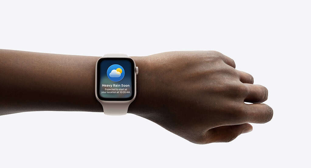 An Apple Watch on a person’s wrist with watchOS 26