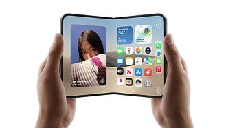An unfolded iPhone Duo held in two hands