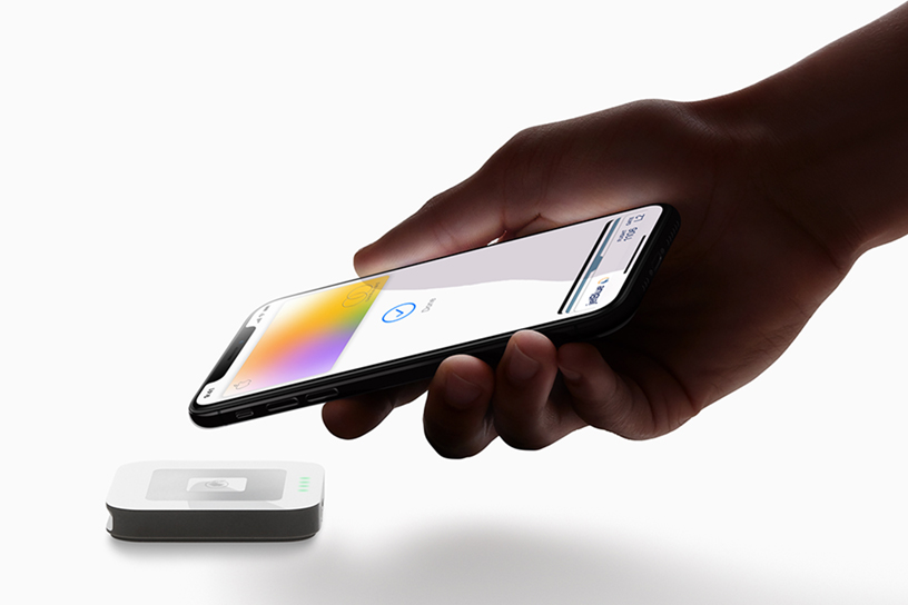 Paying with Apple Card through Apple Pay on iPhone at a contactless reader
