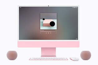 HomePod mini 2 used as a speaker next to a Mac