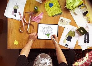 Bunyamin Aydin sketching a hot-air balloon design on iPad Pro with Apple Pencil Pro