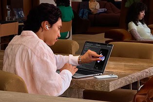 MacBook Pro with PROLED XDR Display in use for remote work