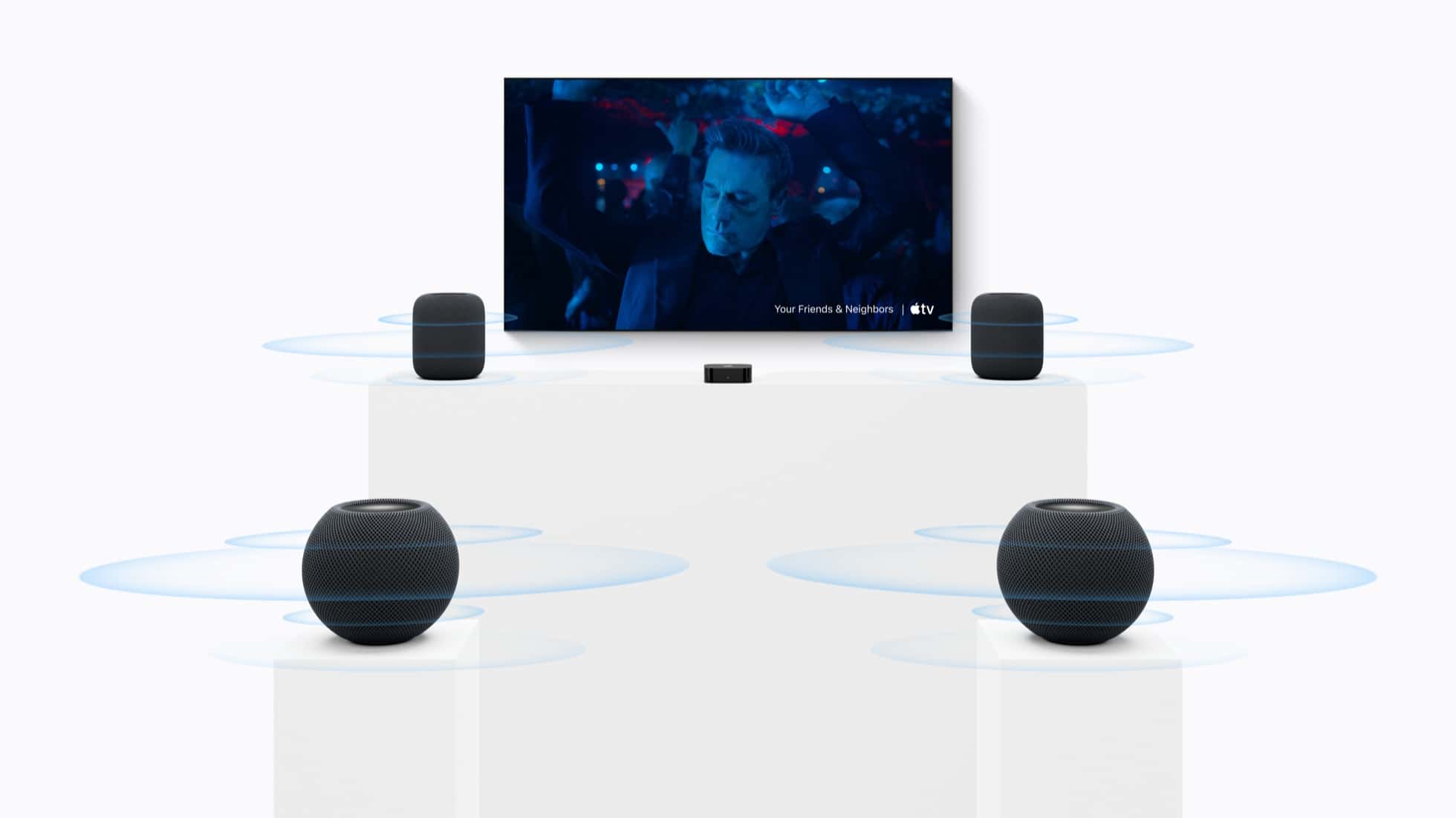 Apple TV 4K with four HomePod mini 2 speakers in a surround sound setup