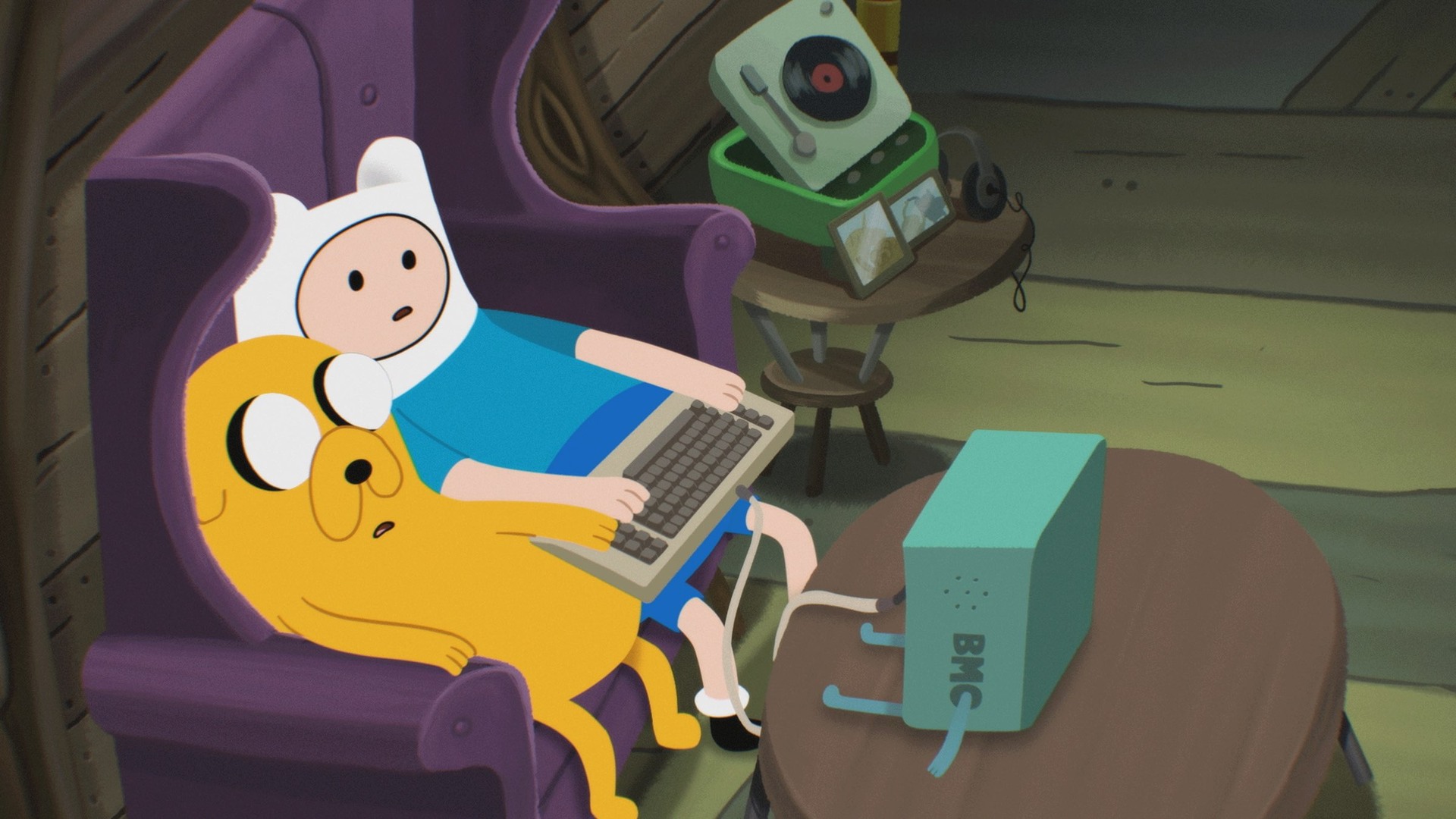 Finn and Jake sit together at an old computer in Text-Based Journey to Donut Palace