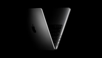 Current Apple MacBook Pro shown open against a dark background