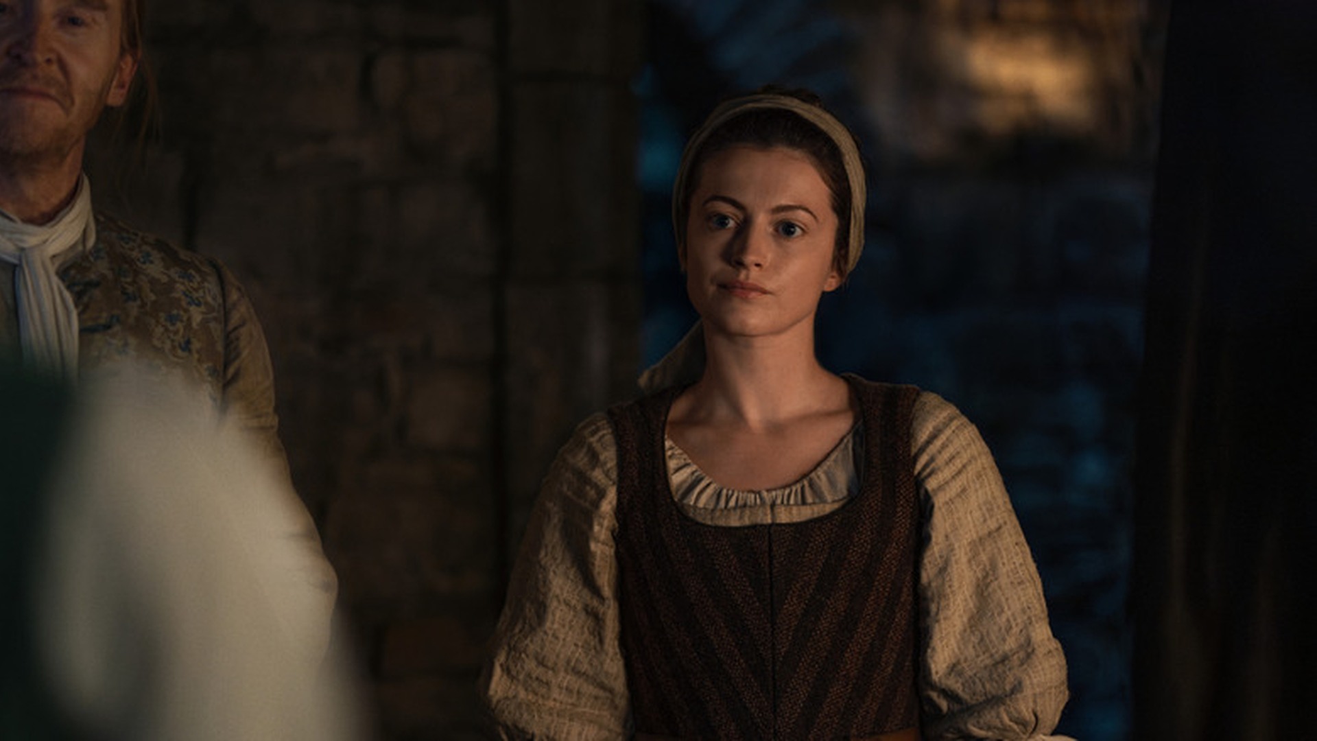 Seema stands inside Castle Leathers in Outlander: Blood of My Blood Season 2