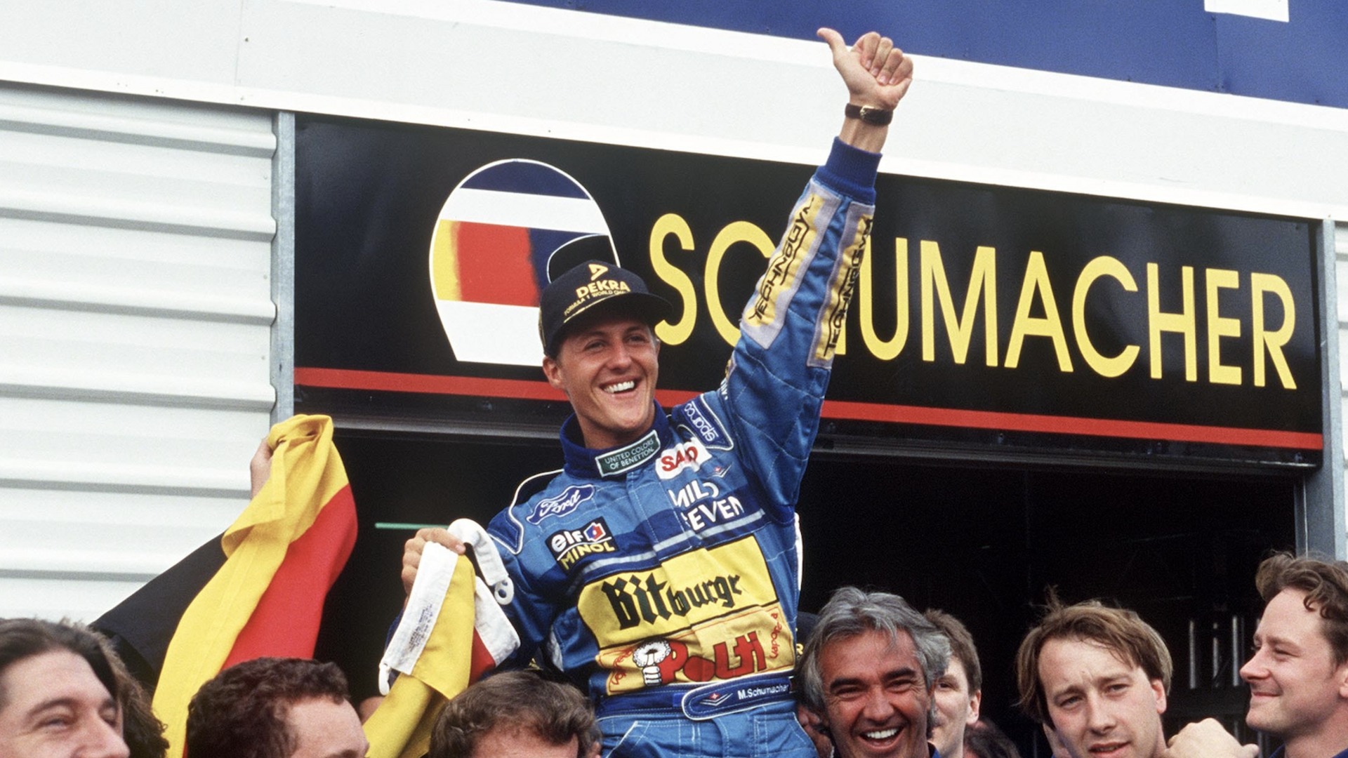 Michael Schumacher celebrates with his Benetton team in an archival photograph used to promote Schumacher '94