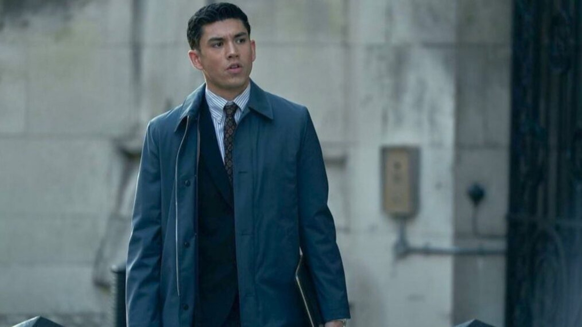 Archie Renaux as Johnny Warren walks outside in HBO's War